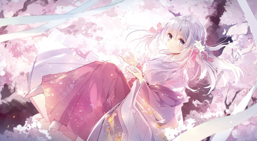 1girl bangs bow commentary_request day eyebrows_visible_through_hair flower grey_hair hair_between_eyes hair_bow hair_flower hair_ornament hakama hands_up highres in_tree japanese_clothes kimono long_sleeves mochizuki_shiina no_shoes original outdoors petals pink_bow pink_flower red_hakama socks solo tabi tree violet_eyes white_flower white_kimono white_legwear wide_sleeves