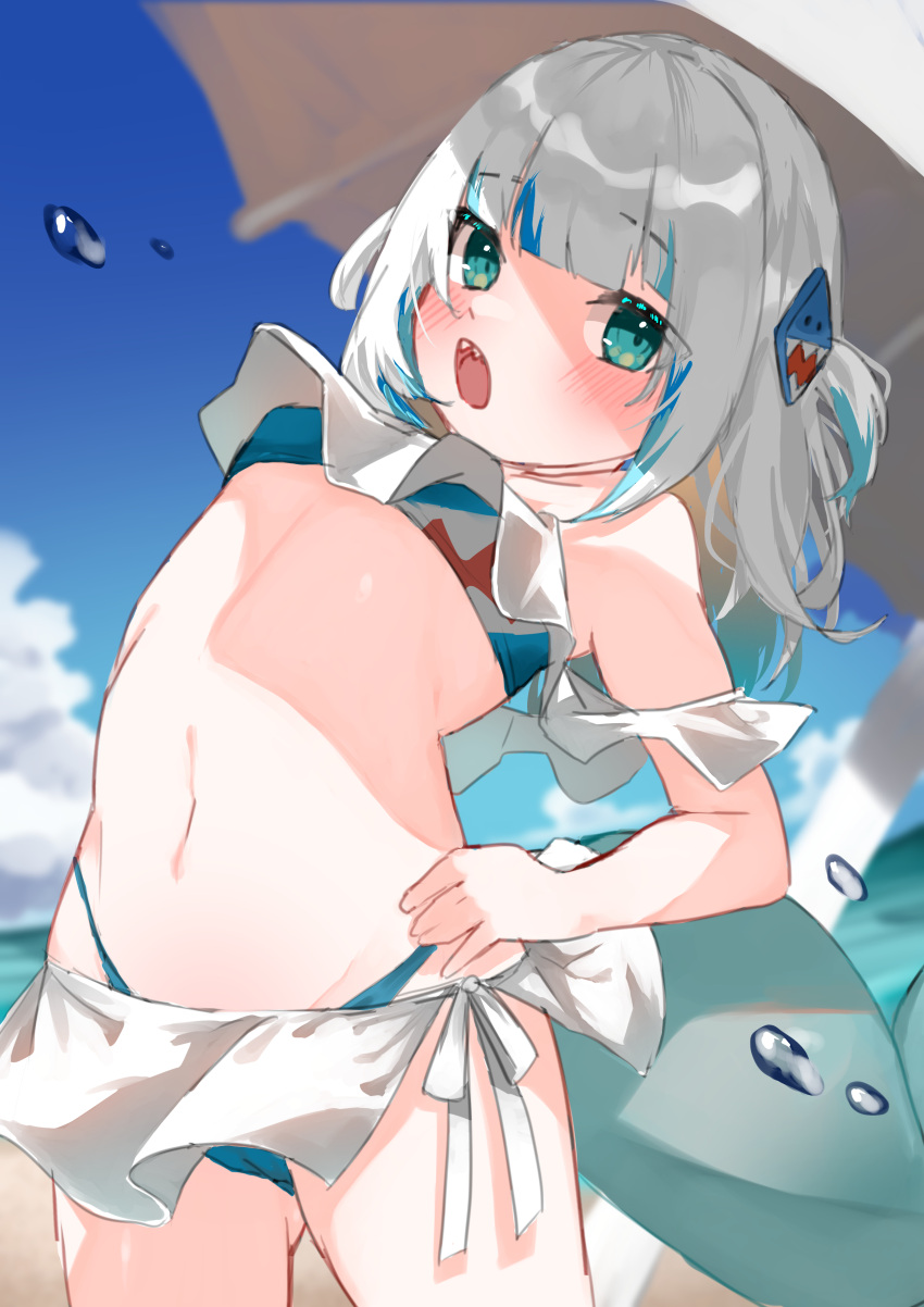 1girl absurdres bangs beach bikini blue_eyes blue_hair blush commentary fish_tail gawr_gura highres hololive hololive_english looking_at_viewer multicolored_hair open_mouth shark_tail sharp_teeth silver_hair solo streaked_hair swimsuit tail takeno_omoti teeth virtual_youtuber
