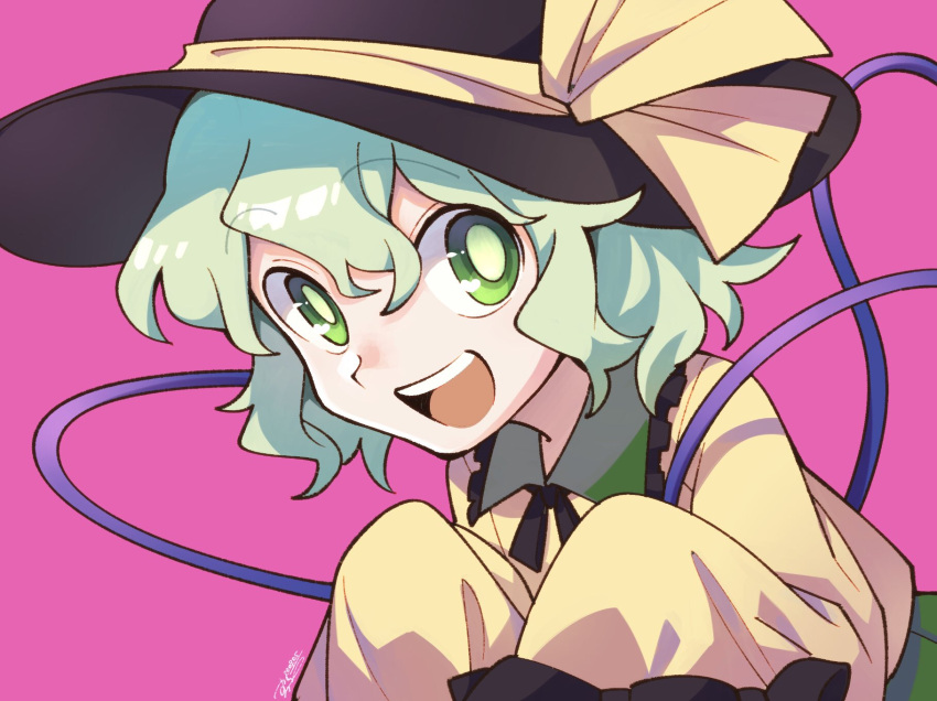 1girl bangs black_headwear black_neckwear blouse bow collar eyebrows_visible_through_hair frills green_collar green_eyes green_hair green_skirt hair_between_eyes hat hat_bow highres holding komeiji_koishi long_sleeves looking_at_viewer open_mouth pink_background shikido_(khf) simple_background skirt smile solo teeth tongue touhou upper_body yellow_blouse yellow_bow yellow_sleeves