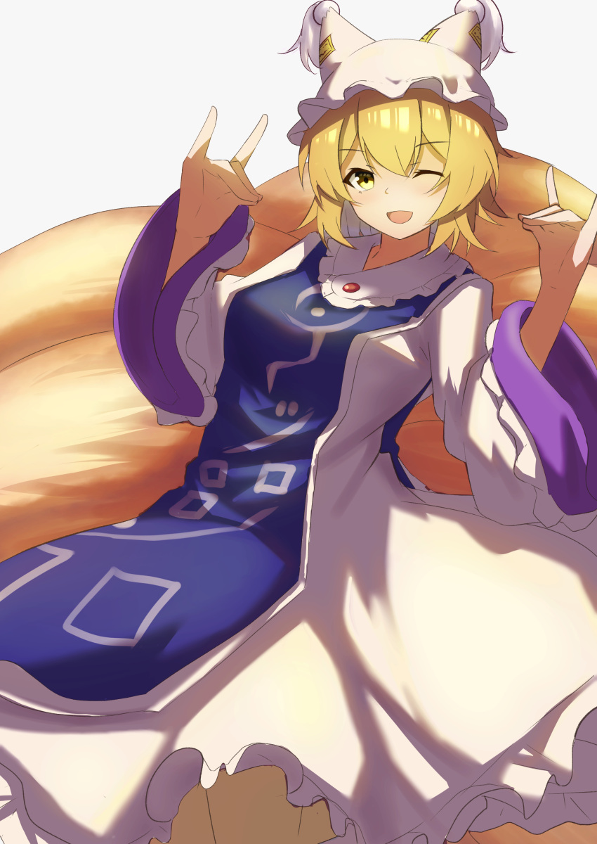 1girl ;d absurdres animal_ears bangs blonde_hair breasts commentary_request eyebrows_visible_through_hair feet_out_of_frame fox_ears fox_shadow_puppet fox_tail frills grey_background hands_up hat highres large_breasts light_blush looking_at_viewer multiple_tails one_eye_closed open_mouth pillow_hat raian_macaroni short_hair smile solo tabard tail tassel touhou white_headwear yakumo_ran yellow_eyes