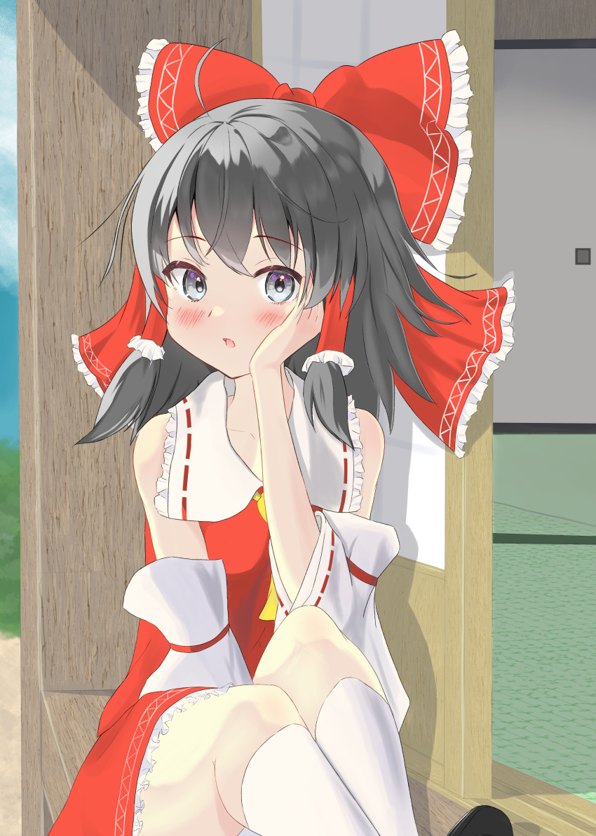 1girl :o absurdres ahoge ascot bangs bare_shoulders black_hair blush bow breasts collarbone commentary_request day detached_sleeves expressionless eyebrows_visible_through_hair feet_out_of_frame frilled_bow frilled_hair_tubes frills grey_eyes hair_bow hair_tubes hakurei_reimu hand_on_own_cheek hand_on_own_face hand_up highres huge_filesize kanetsu-shiki_sueki kneehighs long_hair long_sleeves looking_at_viewer open_mouth petticoat red_bow red_skirt red_vest shadow sidelocks sitting skirt sky small_breasts solo tatami touhou vest white_legwear wide_sleeves yellow_neckwear