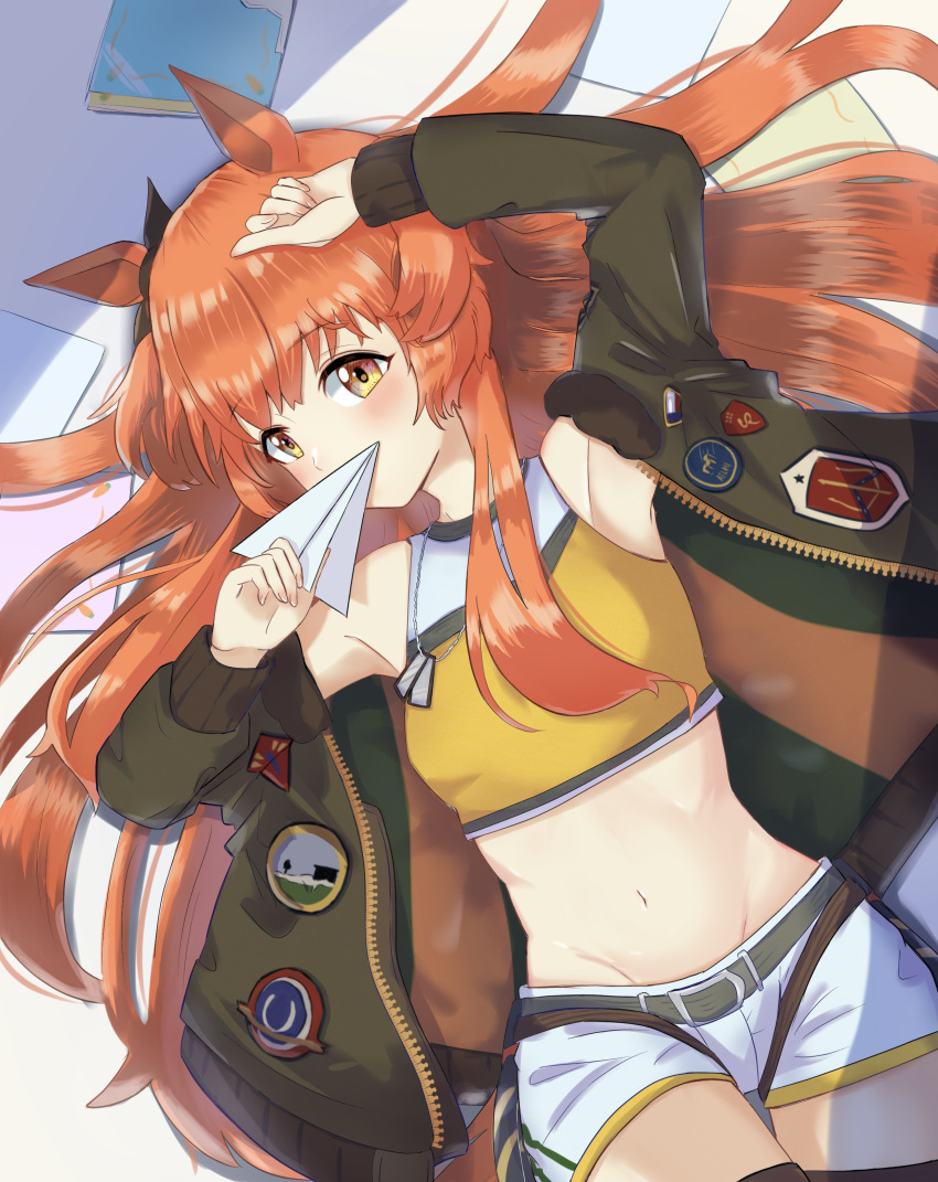 1girl absurdres animal_ears arm_up armpits bare_shoulders belt breasts chahanramen covering_mouth crop_top dog_tags green_jacket hair_ribbon hair_spread_out highres horse_ears jacket long_hair long_sleeves looking_at_viewer lying mayano_top_gun_(umamusume) midriff navel on_back open_clothes open_jacket orange_hair paper_airplane ribbon shirt short_shorts shorts sleeveless sleeveless_shirt small_breasts solo stomach twintails two_side_up umamusume white_shorts yellow_eyes yellow_shirt