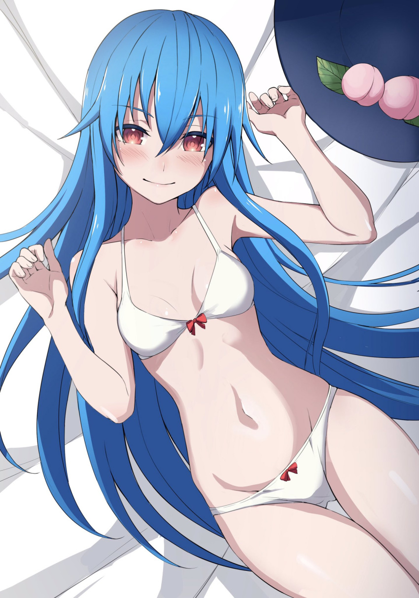 1girl bangs bed_sheet bikini black_headwear blue_hair blush breasts closed_mouth eyebrows_visible_through_hair feet_out_of_frame food fruit groin headwear_removed highres hinanawi_tenshi leaf long_hair looking_at_viewer lying navel on_back on_bed peach red_eyes small_breasts smile solo sweatdrop swimsuit touhou white_bikini yoshinatsu