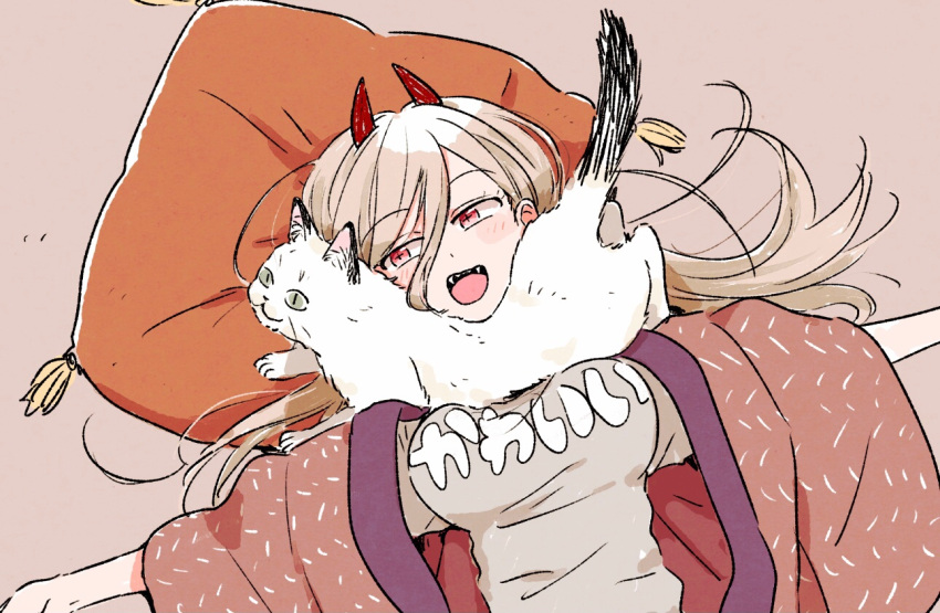 1girl bangs blonde_hair breasts cat chainsaw_man clothes_writing cushion eyebrows_visible_through_hair fangs hair_between_eyes horns large_breasts long_hair lying mokeo on_back open_mouth power_(chainsaw_man) red_eyes shirt tassel upper_body wide_sleeves