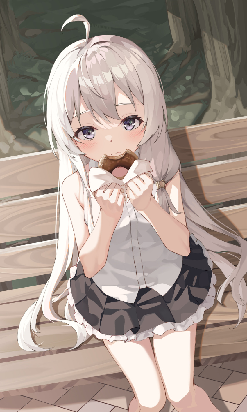 1girl absurdres ahoge bangs bare_arms bare_shoulders black_skirt blush closed_mouth collared_shirt commentary_request doughnut dress_shirt elaina_(majo_no_tabitabi) eyebrows_behind_hair feet_out_of_frame food frilled_skirt frills grey_eyes grey_hair hands_up highres holding holding_food long_hair looking_at_viewer majo_no_tabitabi no_ho pleated_skirt shirt sitting_on_bench skirt sleeveless sleeveless_shirt solo tree very_long_hair wavy_mouth white_shirt