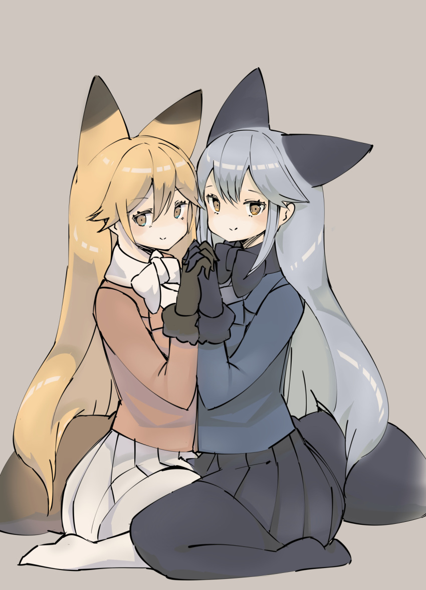 2girls animal_ears bird_witch black_fur black_gloves black_legwear black_neckwear black_skirt blue_jacket blush bow bowtie brown_fur brown_gloves commentary_request extra_ears eyebrows_visible_through_hair ezo_red_fox_(kemono_friends) fox_ears fox_girl fox_tail fur_trim gloves highres holding_hands jacket kemono_friends long_hair long_sleeves multiple_girls no_shoes orange_hair orange_jacket pantyhose pleated_skirt seiza silver_fox_(kemono_friends) silver_hair sitting skirt tail white_legwear white_neckwear white_skirt yellow_eyes