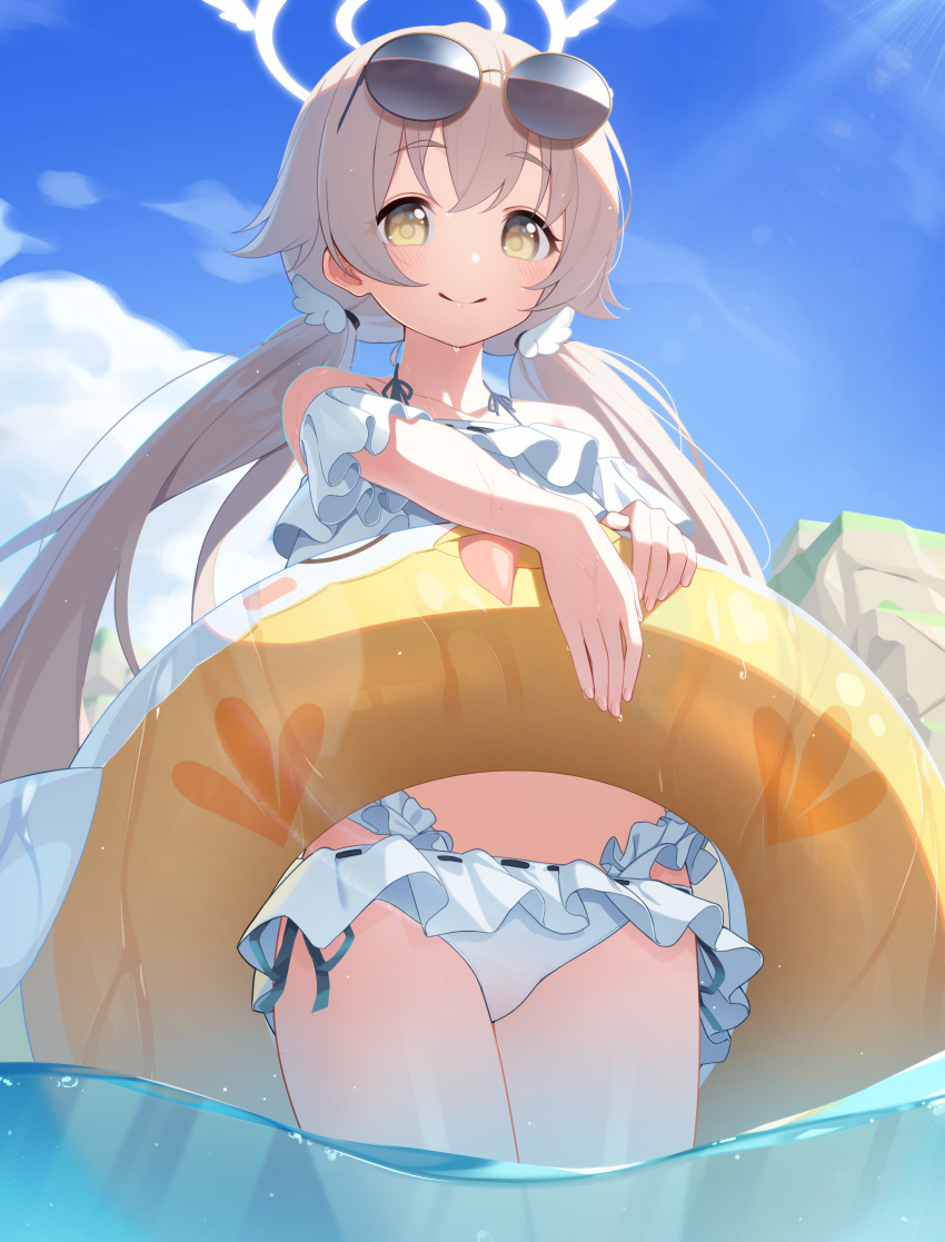 1girl absurdres blue_archive clouds collarbone eyewear_on_head hair_between_eyes halo hifumi_(blue_archive) highres innertube light_brown_hair long_hair looking_at_viewer low_twintails ocean rock sky smile solo sunglasses the_cold twintails wet yellow_eyes