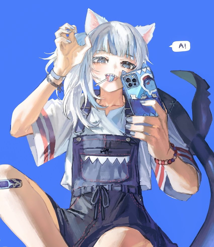 1girl animal_ears animal_print bandaid bandaid_on_knee bandaid_on_leg bloop_(gawr_gura) blue_background blue_eyes blue_hair blue_nails blue_ribbon bracelet candy cat_ears collarbone eyelashes fingernails fish_print fish_tail food food_in_mouth gawr_gura grey_hair highres holding holding_phone hololive hololive_english jewelry light_blue_hair light_blush lollipop long_hair long_sleeves mouth_hold multicolored multicolored_hair phone quasarcake ribbon selfie shark_tail sharp_teeth simple_background solo speech_bubble sticker stitches streaked_hair striped tail teeth upper_teeth virtual_youtuber wide_sleeves