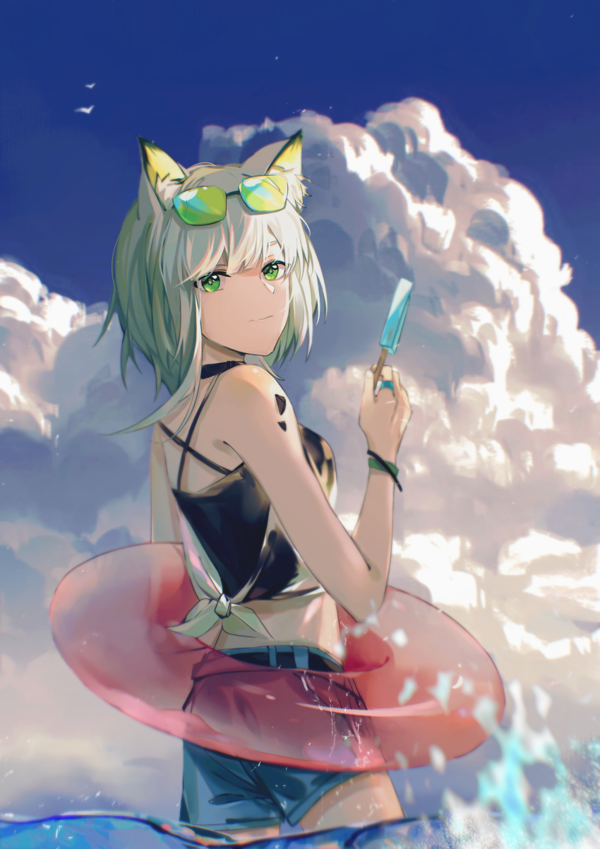 1girl absurdres animal_ear_fluff animal_ears arknights bangs bird black_shirt blue_shorts blue_sky bracelet cat_ears chinese_commentary closed_mouth clouds commentary_request cowboy_shot criss-cross_back-straps eyewear_on_head food gesiyu green-tinted_eyewear green_eyes green_hair hand_up highres holding holding_food innertube jewelry kal'tsit_(arknights) light_smile looking_at_viewer looking_to_the_side medium_hair ocean oripathy_lesion_(arknights) popsicle ring shirt shorts sky sleeveless sleeveless_shirt solo tinted_eyewear wading water