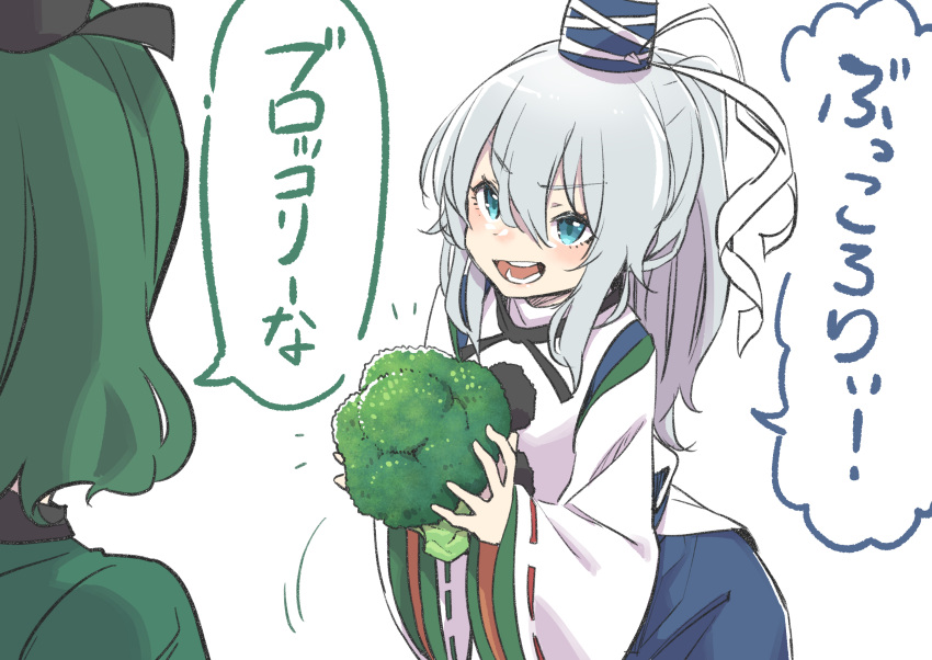 2girls absurdres bangs blue_eyes blue_headwear blue_skirt broccoli commentary dress eyebrows_visible_through_hair food green_dress green_hair grey_hair hat highres holding holding_food holding_vegetable jacket japanese_clothes kariginu kawayabug long_hair long_sleeves looking_at_another mononobe_no_futo multiple_girls open_mouth pom_pom_(clothes) ponytail ribbon-trimmed_sleeves ribbon_trim short_hair simple_background skirt soga_no_tojiko speech_bubble tate_eboshi teeth tongue translated vegetable white_background white_jacket wide_sleeves