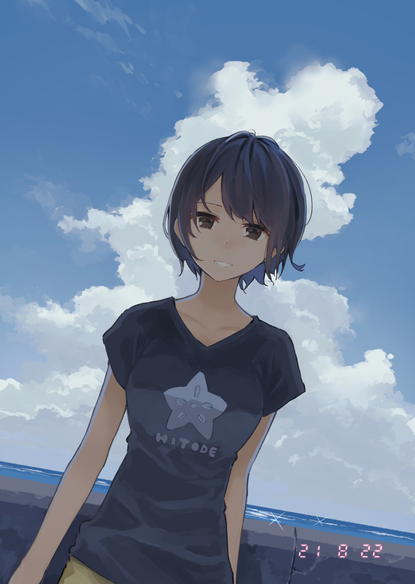 1girl black_hair brown_eyes clouds commentary dutch_angle highres looking_at_viewer minamito ocean original outdoors photo_date_watermark shirt short_hair sky smile solo t-shirt
