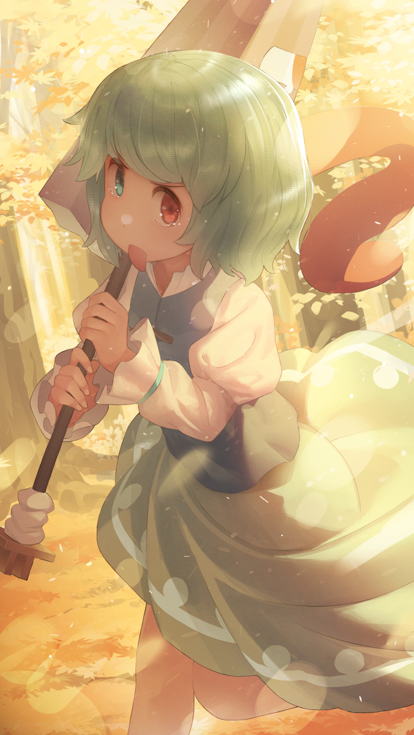 1girl autumn_leaves bangs blue_eyes blue_hair blue_skirt blue_vest forest heterochromia highres holding holding_umbrella juliet_sleeves karakasa_obake leg_up long_sleeves monosenbei nature outdoors puffy_sleeves red_eyes short_hair skirt solo tatara_kogasa tearing_up tongue tongue_out touhou umbrella vest