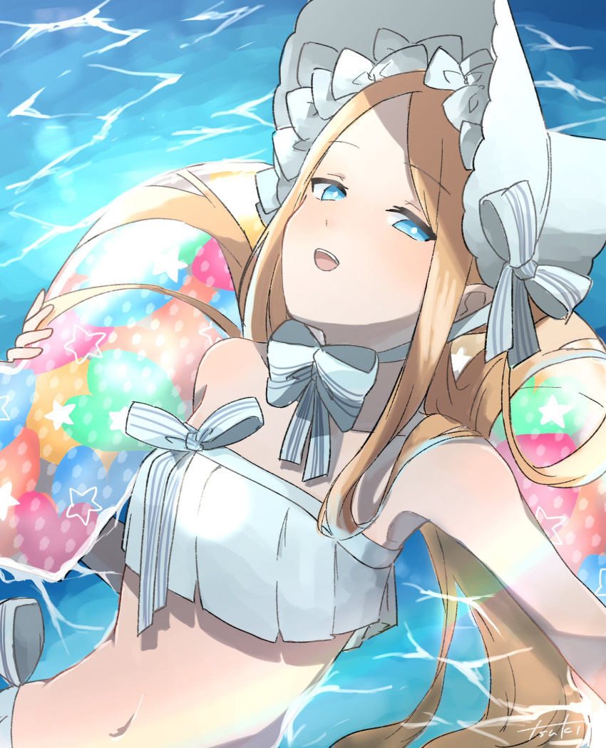 1girl abigail_williams_(fate) abigail_williams_(swimsuit_foreigner)_(fate) bangs bare_shoulders bikini blonde_hair blue_eyes bonnet bow breasts fate/grand_order fate_(series) forehead hair_bow highres innertube long_hair navel ocean open_mouth parted_bangs sidelocks small_breasts smile swimsuit tsu_ki2 twintails very_long_hair white_bikini white_bow white_headwear