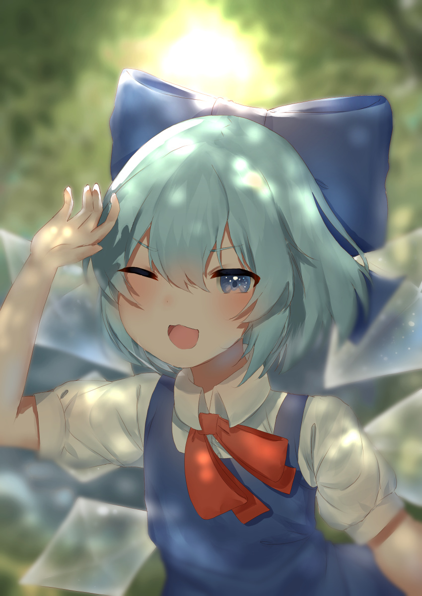 1girl :d absurdres backlighting bangs blue_bow blue_dress blue_hair blurry blurry_background blush bow bowtie cirno depth_of_field dress eyebrows_visible_through_hair hair_between_eyes hand_up highres ice ice_wings light_particles looking_at_viewer one_eye_closed open_mouth pinafore_dress puffy_short_sleeves puffy_sleeves red_bow red_neckwear short_sleeves slepp smile soft_focus solo touhou upper_body wing_collar wings