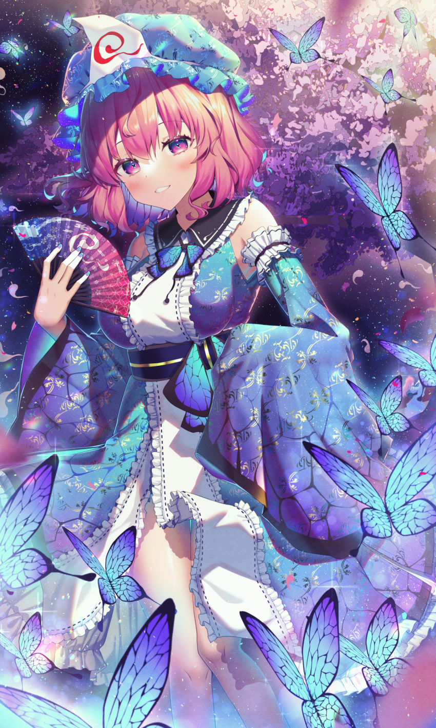 1girl bangs bare_shoulders blue_headwear blue_kimono bug butterfly cherry_blossoms detached_sleeves eyebrows_visible_through_hair floral_print folding_fan hand_fan hat highres holding holding_fan insect japanese_clothes kimono kiramarukou looking_at_viewer mob_cap outdoors pink_eyes pink_hair saigyouji_yuyuko short_hair smile solo standing touhou triangular_headpiece wide_sleeves