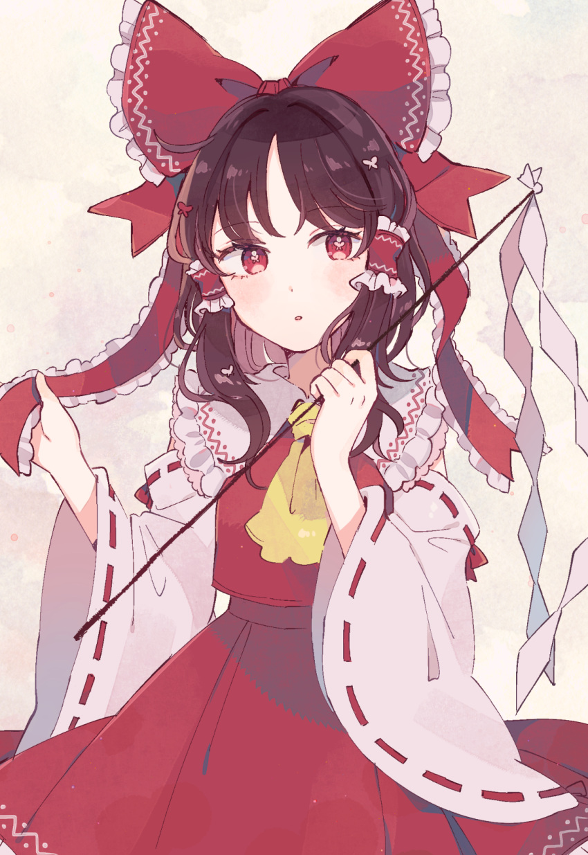 1girl ascot bangs bare_shoulders blush bow brown_hair collar collared_dress detached_sleeves dress eyebrows_visible_through_hair flower flower_in_eye gohei hair_flower hair_ornament hair_tubes hakurei_reimu hands_up highres long_sleeves looking_to_the_side mozukuzu_(manukedori) open_mouth pink_flower red_bow red_dress red_eyes red_flower short_hair simple_background solo symbol_in_eye touhou wide_sleeves yellow_background yellow_neckwear