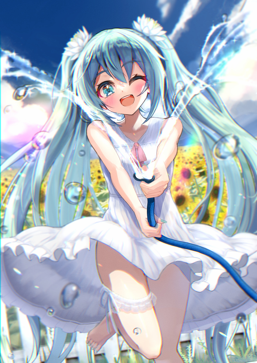 1girl ;d absurdres aqua_eyes aqua_hair bangs bare_arms bare_shoulders barefoot blue_sky blush clouds cloudy_sky commentary_request day dress eyebrows_visible_through_hair fence field flower flower_field hair_between_eyes hair_flower hair_ornament hatsune_miku highres holding holding_hose hose long_hair looking_at_viewer npon515 one_eye_closed open_mouth outdoors sky sleeveless sleeveless_dress smile solo standing standing_on_one_leg sunflower twintails upper_teeth very_long_hair vocaloid water white_dress white_flower yellow_flower