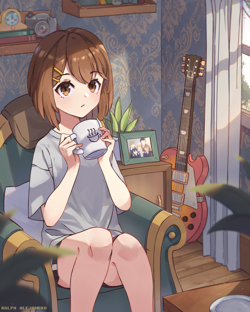 1girl armchair artist_name bangs black_shorts blurry blurry_foreground brown_hair chair clock closed_mouth commentary cup curtains drink drinking electric_guitar english_commentary guitar hair_ornament hairclip highres hirasawa_yui holding holding_cup holding_drink instrument k-on! looking_at_viewer paisley photo_(object) plant potted_plant ralph_alejandro shelf shirt shorts solo t-shirt wallpaper_(object) white_shirt window wooden_floor