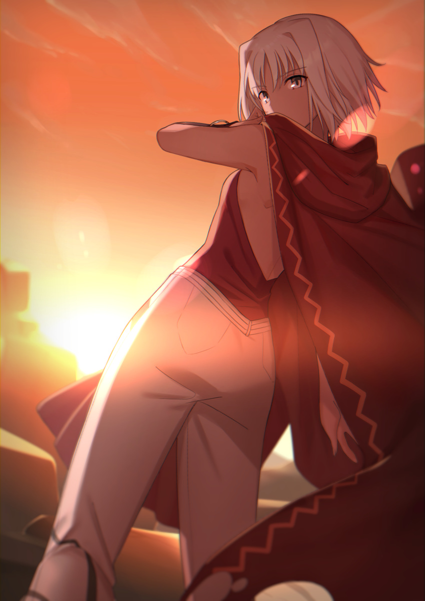 1girl 428 absurdres backless_outfit canaan canaan_(character) cape dusk eyebrows_visible_through_hair from_behind hair_between_eyes highres looking_at_viewer looking_back okakasushi orange_sky outdoors pants red_cape red_shirt shirt short_hair silver_hair sky sleeveless sleeveless_shirt solo white_pants