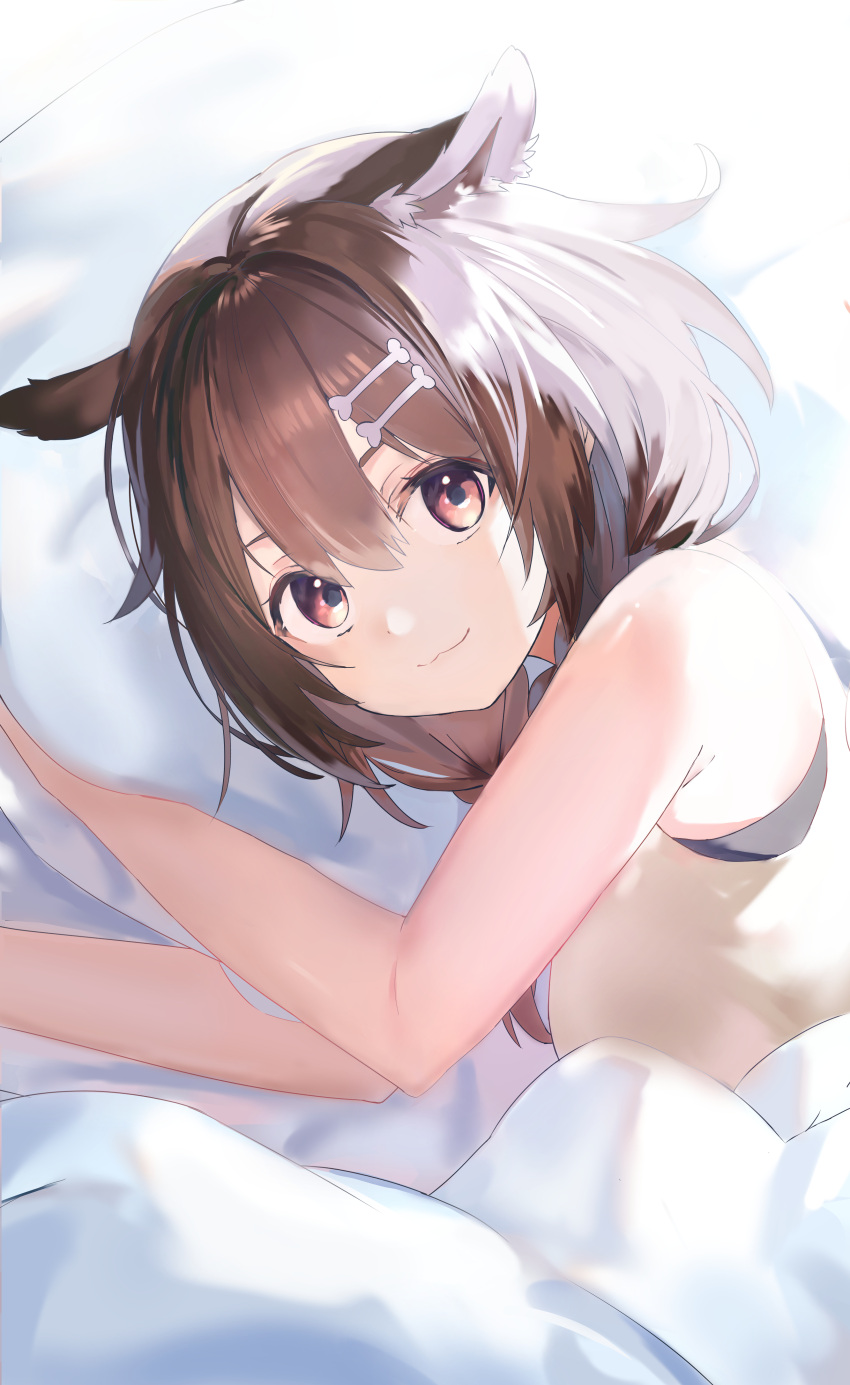 1girl :3 absurdres animal_ears bone_hair_ornament braid brown_hair derby_(dabidabi) dog_ears hair_between_eyes hair_ornament highres hololive inugami_korone looking_at_viewer lying medium_hair on_side pillow red_eyes shirt sleeveless sleeveless_shirt smile solo under_covers upper_body virtual_youtuber white_shirt