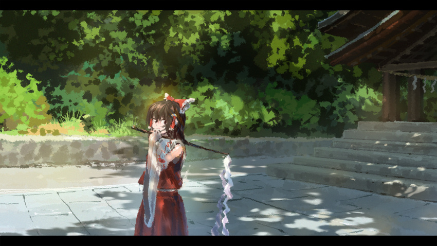 1girl bangs bow brown_eyes brown_hair closed_mouth commentary_request cowboy_shot day detached_sleeves frilled_bow frills gohei hair_bow hair_tubes hakurei_reimu highres holding letterboxed looking_at_viewer medium_hair nature one-hour_drawing_challenge outdoors red_bow red_shirt red_skirt scenery shirt shrine skirt skirt_set sleeveless sleeveless_shirt smile solo suzu_(susan_slr97) touhou white_sleeves wide_sleeves