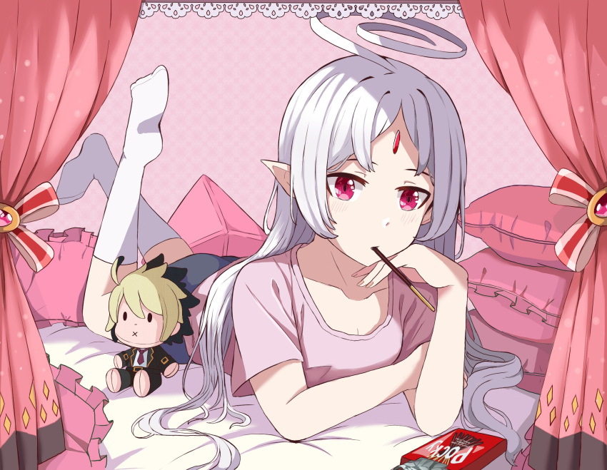 1girl ahoge aruvian13 character_doll commission curtains feet_up food forehead_jewel highres hyde_(under_night_in-birth) lying on_stomach pillow pink_shirt pocky pointy_ears red_eyes shirt socks under_night_in-birth vatista white_hair