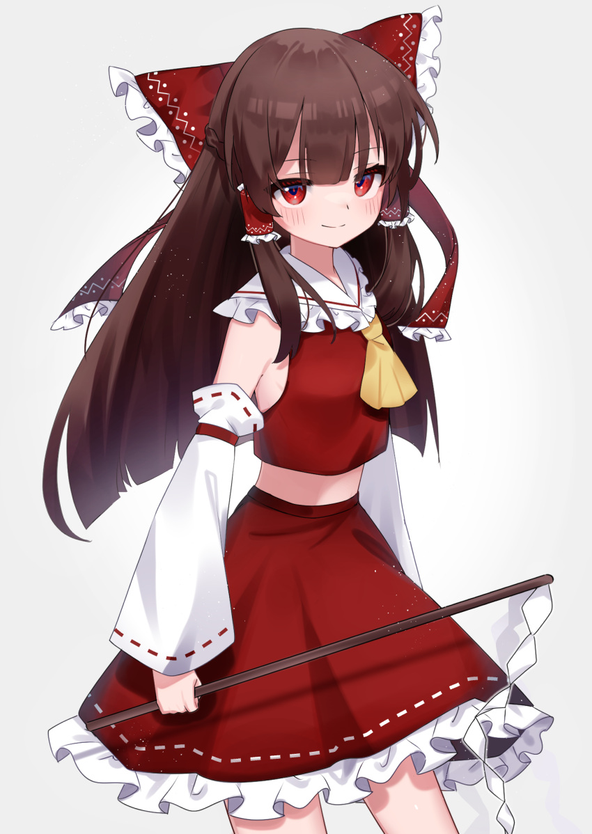 1girl ascot bangs bare_shoulders blush bow breasts brown_hair closed_mouth contrapposto detached_sleeves eyebrows_visible_through_hair feet_out_of_frame frilled_bow frilled_hair_tubes frilled_shirt_collar frills hair_bow hair_tubes hakurei_reimu highres light_particles long_hair long_sleeves looking_at_viewer petticoat red_bow red_eyes red_skirt red_vest sidelocks simple_background skirt small_breasts smile solo suikario touhou very_long_hair vest white_background yellow_neckwear