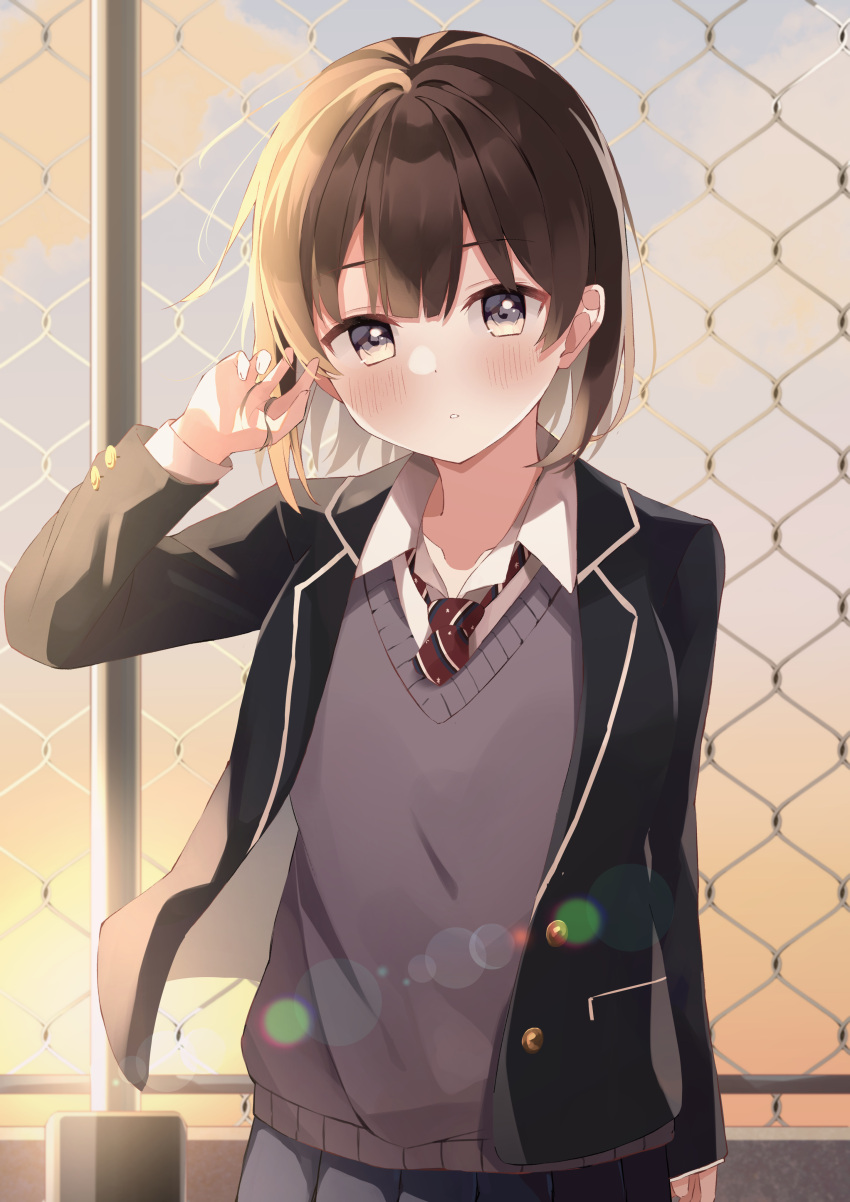 1girl absurdres akagikou black_jacket black_skirt blazer blush brown_hair chain-link_fence collared_shirt commentary_request diagonal-striped_neckwear diagonal_stripes fence grey_eyes hand_in_hair hand_up highres jacket long_sleeves looking_at_viewer necktie open_clothes open_jacket original outdoors parted_lips pleated_skirt red_neckwear school_uniform shirt skirt solo striped striped_neckwear sunset sweater_vest white_shirt