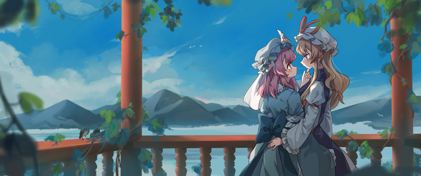 2girls absurdres animal baozishark bird blonde_hair blue_headwear blue_kimono blush chinese_commentary day dress frilled_kimono frilled_sleeves frills hat hat_ribbon highres japanese_clothes kimono long_hair mob_cap mountain multiple_girls pink_eyes pink_hair red_ribbon ribbon saigyouji_yuyuko short_hair sleeves_past_fingers sleeves_past_wrists tabard touhou violet_eyes white_dress white_headwear wide_sleeves yakumo_yukari yuri