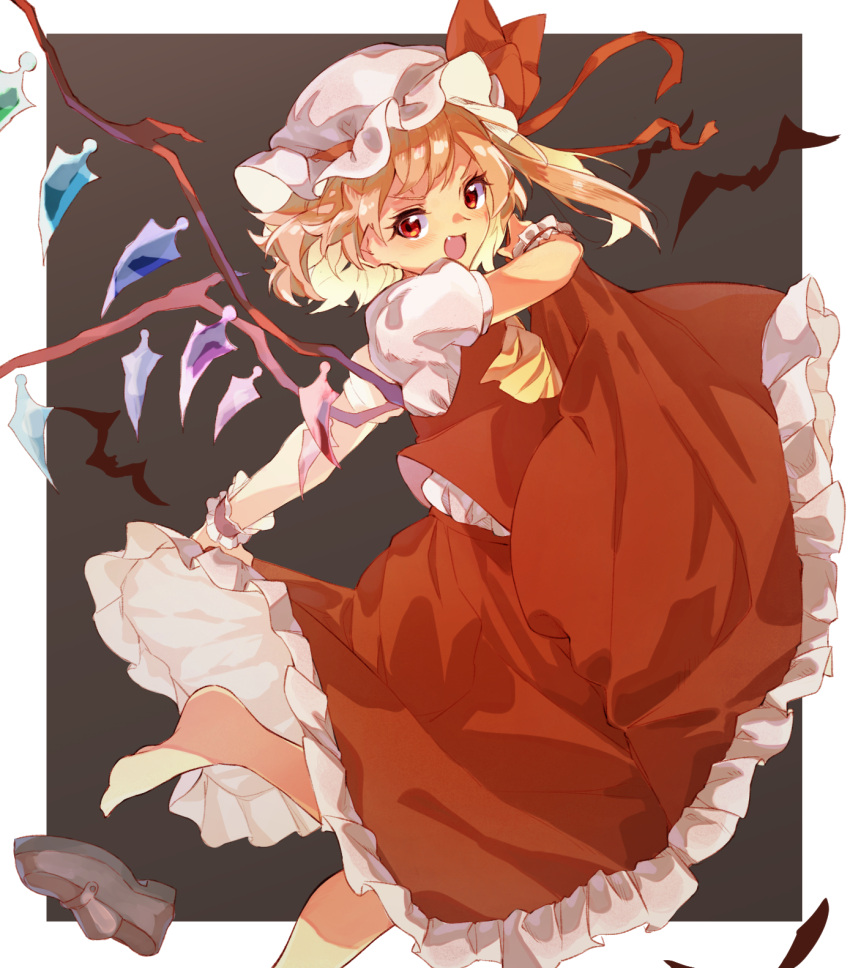 1girl :d arm_up ascot bangs barefoot bat blonde_hair blush border bow commentary_request crystal fang flandre_scarlet foot_out_of_frame grey_background hat hat_bow highres looking_at_viewer mob_cap one_side_up open_mouth outside_border petticoat puffy_short_sleeves puffy_sleeves red_bow red_eyes red_skirt red_vest shoes shoes_removed short_sleeves simple_background skirt smile solo standing standing_on_one_leg tamiku_(shisyamo609) touhou v-shaped_eyebrows vest white_border white_headwear wings wrist_cuffs yellow_neckwear