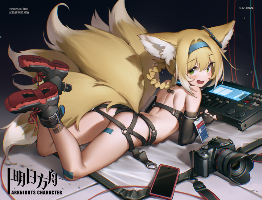 1girl :d absurdres animal_ear_fluff animal_ears arknights ass bare_legs bare_shoulders bilibili_xiaolu black_footwear black_gloves blonde_hair blue_hairband chinese_commentary commentary_request copyright_name elbow_gloves fingerless_gloves fox_ears fox_tail gloves hairband highres huge_filesize looking_at_viewer lying multiple_tails on_stomach open_mouth shoes smile solo suzuran_(arknights) tail thighs