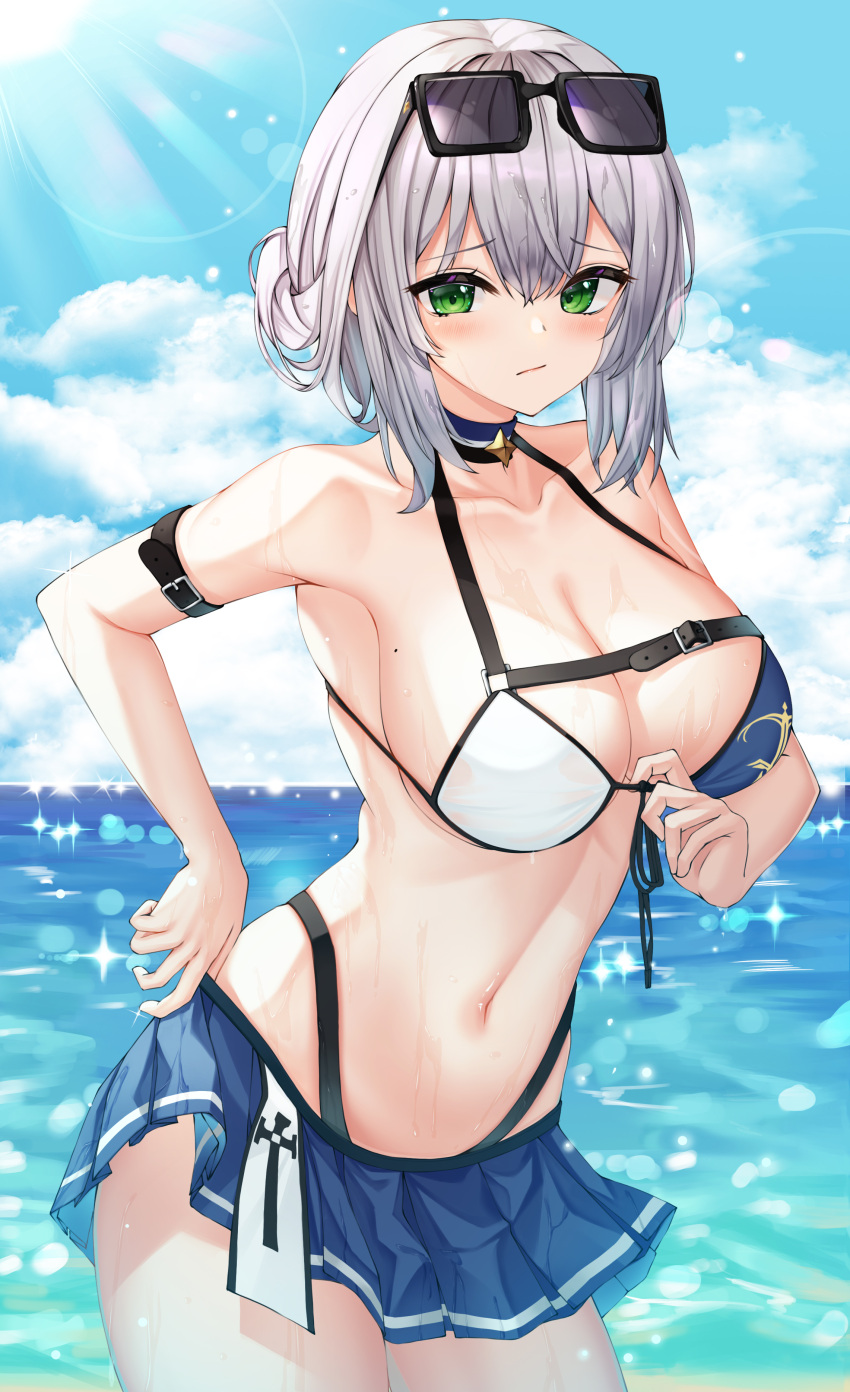 1girl absurdres armband bikini blue_sky blush breasts choker clouds collarbone embarrassed eyewear_on_head green_eyes highres hololive hsxxx large_breasts looking_at_viewer mole mole_on_breast navel ocean outdoors pleated_skirt shirogane_noel skirt sky solo strap sun sun_glare sunglasses sunlight swimsuit swimsuit_skirt under_boob virtual_youtuber water white_hair