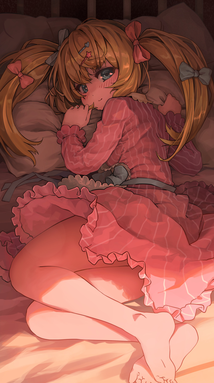 1girl bangs barefoot blonde_hair blue_bow blue_eyes blush bow closed_mouth commission dress eyebrows_visible_through_hair frilled_dress frills hair_bow hair_ornament hairclip heart heart_hair_ornament highres long_hair long_sleeves looking_at_viewer lying melaton on_bed on_side original pillow pink_bow pink_dress skeb_commission smile soles solo star_(symbol) star_hair_ornament striped twintails vertical-striped_dress vertical_stripes