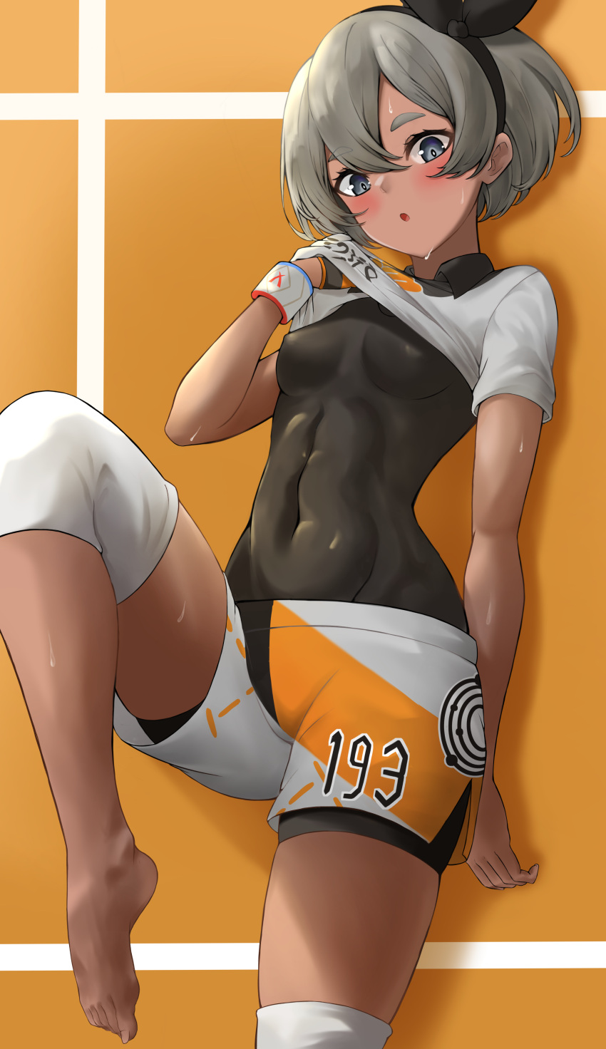 1girl absurdres bangs barefoot bea_(pokemon) black_bodysuit black_hairband blush bodysuit bodysuit_under_clothes bow_hairband breasts collared_shirt commentary_request covered_abs covered_navel dark_skin dstwins97 dynamax_band gloves grey_eyes grey_hair hair_between_eyes hairband hand_up highres knee_pads leg_up looking_at_viewer pokemon pokemon_(game) pokemon_swsh print_shirt print_shorts shirt short_hair short_sleeves shorts side_slit side_slit_shorts single_glove solo sweat toes