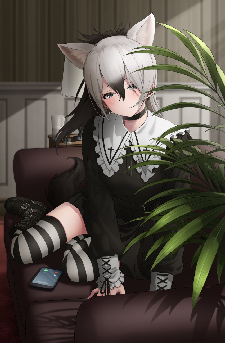 1girl aardwolf_(kemono_friends) aardwolf_ears aardwolf_tail absurdres alternate_costume animal_ear_fluff animal_ears bangs belt_boots black_choker black_footwear black_hair black_skirt blurry blurry_background boots carpet cellphone choker couch cup deku_suke depth_of_field drinking_glass ear_piercing extra_ears frills grey_eyes hair_between_eyes hair_in_mouth highres indoors kemono_friends lamp long_hair long_sleeves looking_at_viewer multicolored_hair on_couch phone piercing pill plant pleated_skirt ponytail sitting skirt smartphone solo striped striped_legwear tail thigh-highs white_hair yokozuwari