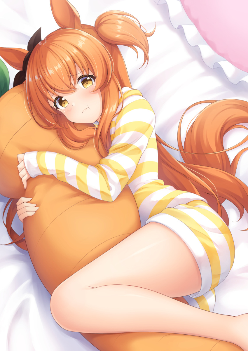 1girl 7fuji_06 animal_ears bangs bed_sheet carrot_pillow commentary_request ear_bow feet_out_of_frame highres horse_ears horse_girl horse_tail long_hair long_sleeves looking_at_viewer lying mayano_top_gun_(umamusume) object_hug on_side orange_hair pajamas pillow pillow_hug pout raised_eyebrows shorts sleeves_past_wrists solo stuffed_carrot tail thigh-highs thighs twintails two_side_up umamusume yellow_eyes