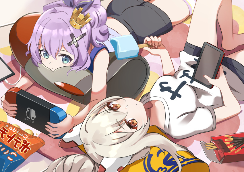 2girls ayanami_(azur_lane) azur_lane bangs black_shorts cellphone chips commentary_request controller crown dual_wielding eyebrows_visible_through_hair food from_above game_controller green_eyes hair_between_eyes hair_ornament hairclip headgear highres holding holding_controller holding_game_controller holding_phone javelin_(azur_lane) knee_up long_hair looking_at_viewer looking_up lying manjirou_(manji_illust) mini_crown multiple_girls nintendo_switch official_alternate_costume on_back on_stomach orange_eyes package phone pillow pocky ponytail popsicle potato_chips purple_hair short_sleeves shorts sidelocks silver_hair smartphone snack striped striped_legwear translation_request
