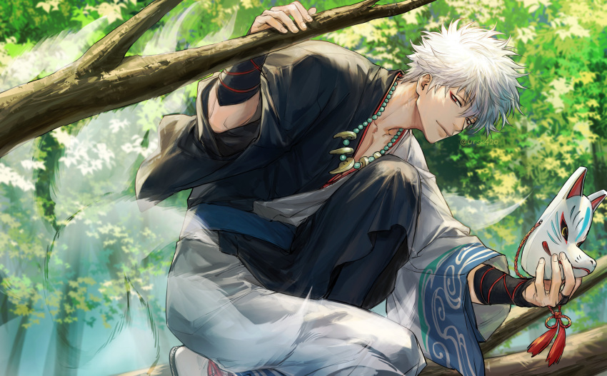 1boy arm_up bangs bead_necklace beads black_kimono bridal_gauntlets closed_mouth commentary_request day eyebrows_visible_through_hair fox_mask fox_tail gintama hair_between_eyes highres holding holding_mask in_tree japanese_clothes jewelry kemonomimi_mode kimono knee_up kyuubi long_sleeves looking_at_viewer male_focus mask multiple_tails necklace one_knee outdoors red_eyes sakata_gintoki socks solo tail tree twitter_username uraki_(tetsu420) white_hair white_kimono white_legwear wide_sleeves
