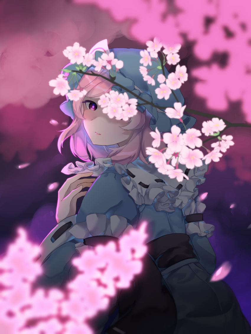 1girl bangs belt black_belt blue_dress blue_headwear blue_kimono blue_sleeves branch cherry_blossoms closed_mouth dress eyebrows_visible_through_hair flower from_behind hand_up hat highres japanese_clothes kimono long_sleeves looking_at_viewer mob_cap petals pink_eyes pink_flower pink_hair saigyouji_yuyuko shaded_face shadow short_hair solo touhou triangular_headpiece wankosoba wide_sleeves