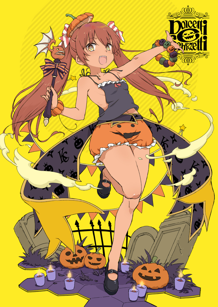 1girl aka_ringo black_footwear blush brown_eyes brown_hair candle eyebrows_visible_through_hair full_body hair_between_eyes halloween halloween_costume highres jack-o'-lantern kantai_collection libeccio_(kancolle) long_hair mary_janes official_alternate_costume open_mouth orange_headwear orange_shorts pumpkin_hat shoes shorts smile solo standing standing_on_one_leg star_(symbol) tombstone twintails yellow_background