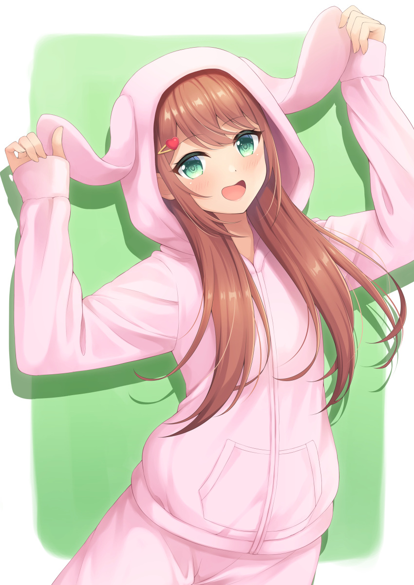 1girl 7fuji_06 absurdres animal_hood arms_up bangs blush border brown_hair bunny_hood clothes_grab commentary_request cowboy_shot eyebrows_visible_through_hair green_background green_eyes highres hood hood_up hoodie leaning_to_the_side long_hair looking_at_viewer open_mouth original pajamas pants pink_hoodie pink_pants pocket sidelocks simple_background smile solo white_border