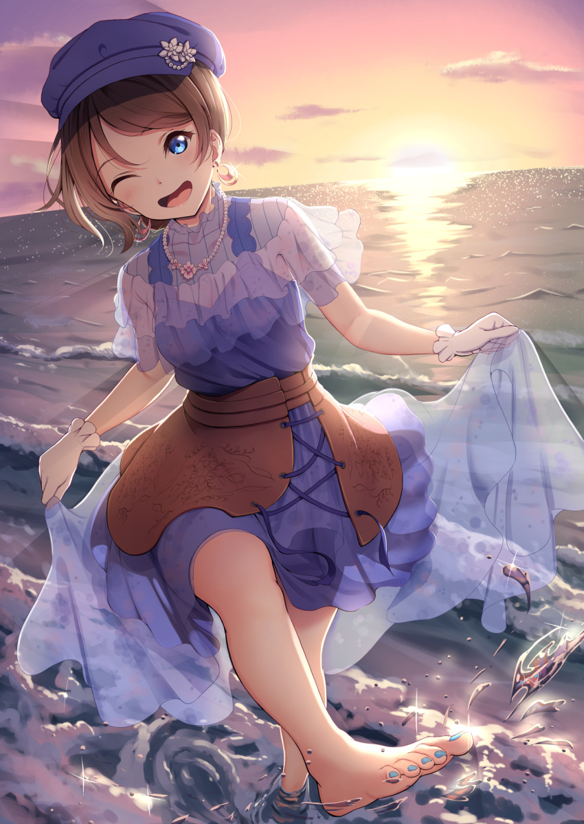 1girl ;d amagi_(volfuji) blue_dress blue_eyes blue_headwear blush clothes_lift clouds dress dress_lift earrings floral_print hat highres horizon jewelry kicking looking_at_viewer love_live! love_live!_sunshine!! necklace ocean one_eye_closed open_mouth outdoors see-through_dress sky smile solo sun sunlight sunset watanabe_you water water_drop