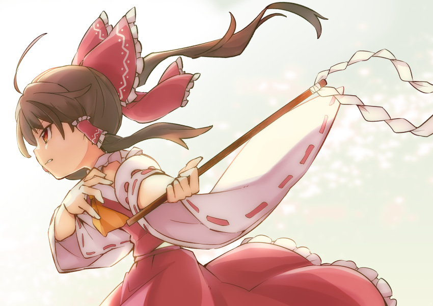 1girl ascot bare_shoulders bow brown_eyes brown_hair detached_sleeves from_side gohei hair_bow hair_tubes hakurei_reimu highres japanese_clothes medium_hair nontraditional_miko red_bow red_skirt ribbon-trimmed_sleeves ribbon_trim sidelocks skirt solo touhou wide_sleeves yellow_neckwear yutamaro
