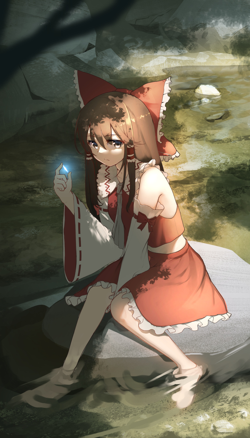 1girl absurdres ascot bangs bare_shoulders barefoot bow branch brown_eyes brown_hair closed_mouth dappled_sunlight day detached_sleeves frilled_bow frilled_hair_tubes frilled_shirt_collar frilled_skirt frills gem hair_bow hair_tubes hakurei_reimu highres holding holding_gem irochan long_hair long_sleeves looking_at_viewer midriff nontraditional_miko red_bow red_skirt red_vest ribbon-trimmed_sleeves ribbon_trim river sidelocks sitting sitting_on_rock skirt solo sunlight touhou vest water wide_sleeves yellow_ascot