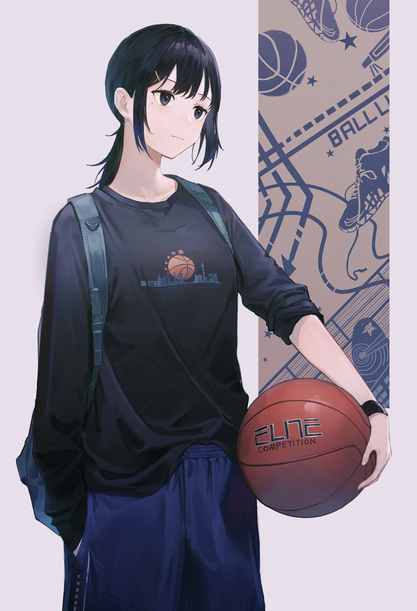 1girl absurdres backpack bag ball bangs basketball black_eyes black_hair black_shirt black_wristband blue_shorts english_text hair_ornament hand_in_pocket highres holding holding_ball long_sleeves medium_hair mole mole_under_eye original ponytail print_shirt shichi_(ratorin53) shirt shorts sidelocks solo symbol-only_commentary wristband