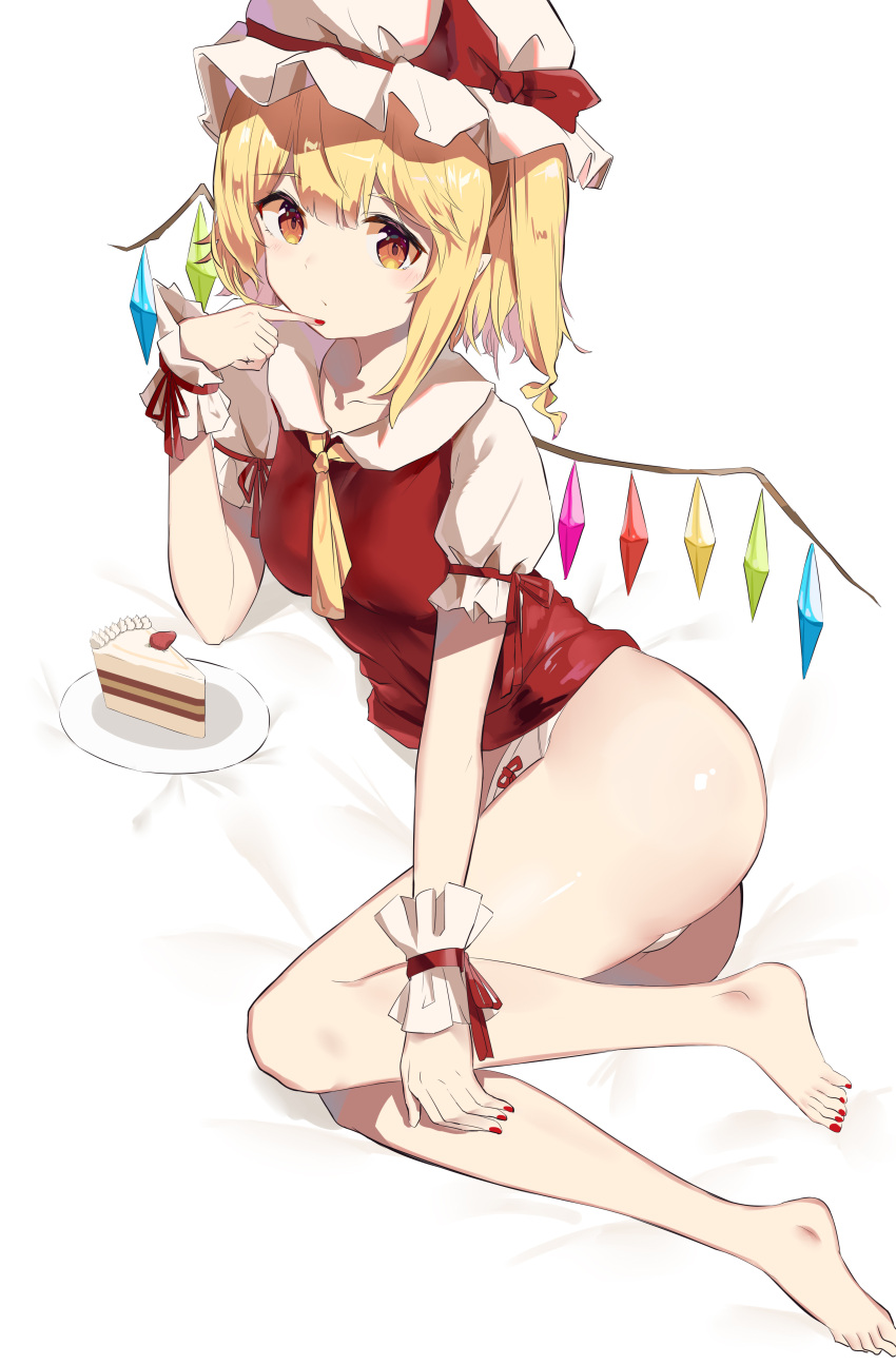 1girl :/ absurdres bangs blonde_hair blush brown_eyes cake cake_slice commentary_request crystal eyebrows_visible_through_hair feet flandre_scarlet food hair_between_eyes hat highres jsscj looking_at_viewer lying mob_cap on_side one_side_up simple_background solo toes touhou white_background wings