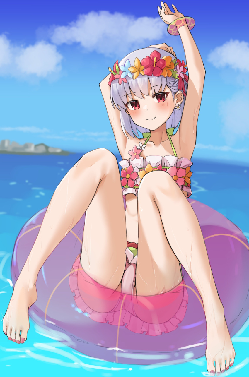 1girl absurdres armpits arms_up bangs bare_shoulders beach bikini blue_sky blush breasts collarbone fate/grand_order fate_(series) flower_wreath green_bikini hair_ribbon head_wreath highres innertube kama_(fate) kama_(swimsuit_avenger)_(fate) knees_up kopaka_(karda_nui) legs looking_at_viewer miniskirt ocean rainbow_skirt red_eyes ribbon short_hair silver_hair skirt sky small_breasts smile solo swimsuit wet