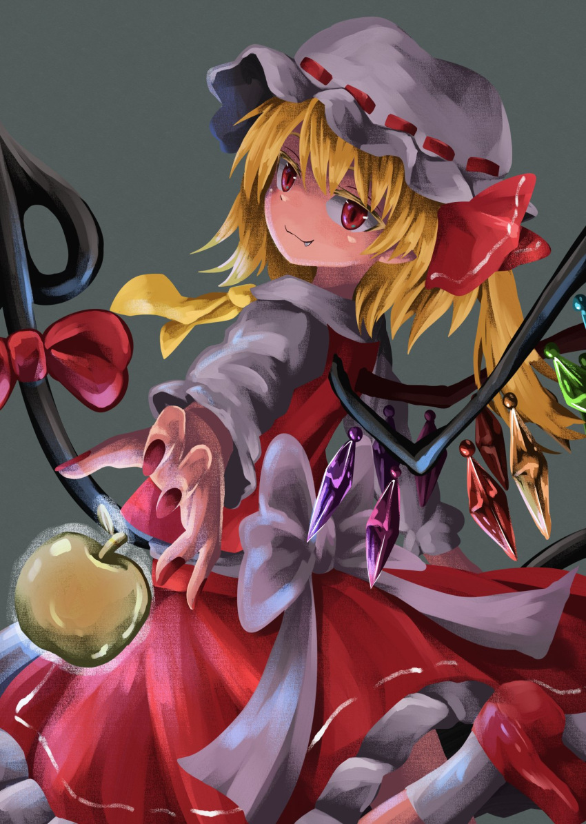 1girl :3 apple ascot bangs blonde_hair chups closed_mouth colored_eyelashes crystal fang flandre_scarlet food from_side fruit golden_apple grey_background hat hat_ribbon highres holding laevatein_(touhou) long_sleeves looking_at_viewer one_side_up pointy_ears red_eyes red_footwear red_nails red_ribbon red_skirt red_vest ribbon ribbon-trimmed_headwear ribbon_trim shirt short_hair simple_background skirt smile solo touhou vest white_headwear white_legwear white_shirt wings yellow_neckwear