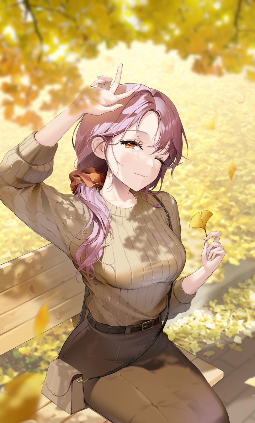 absurdres arm_up bag bangs bbakasatang belt belt_buckle black_belt blurry blurry_foreground blush breasts brown_skirt brown_sweater buckle closed_mouth commentary ginkgo_leaf hair_ornament hair_scrunchie highres holding holding_leaf leaf long_hair long_sleeves looking_at_viewer medium_breasts on_bench one_eye_closed original red_eyes redhead scrunchie shoulder_bag sitting skirt sweater symbol-only_commentary