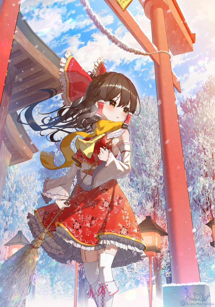 1girl ascot bangs bare_shoulders blush boots bow breasts broom brown_eyes closed_mouth commentary_request detached_sleeves eyelashes floral_print frilled_bow frilled_skirt frilled_sleeves frills garter_straps hair_bow hair_ribbon hair_tubes hakurei_reimu hakurei_shrine highres holding holding_broom kiramarukou knee_boots lantern long_hair long_sleeves looking_to_the_side medium_breasts nontraditional_miko red_bow red_ribbon red_skirt red_vest ribbon rope scarf shimenawa sidelocks signature skirt solo standing torii touhou twitter_username vest white_footwear white_sleeves wide_sleeves winter yellow_ascot yellow_neckwear yellow_scarf